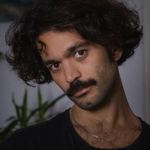 Nizam E.